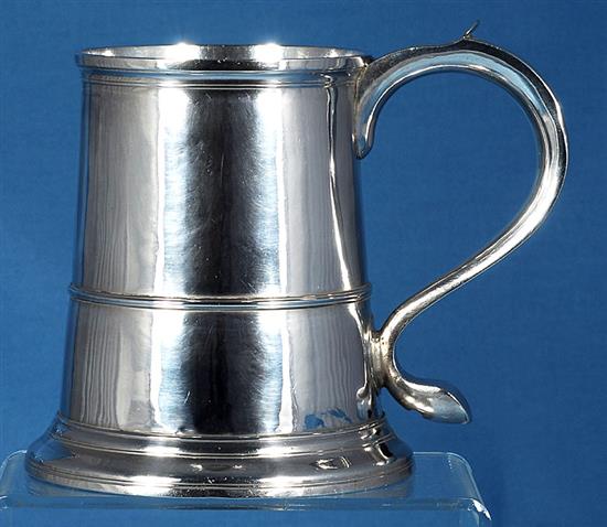 A George II provincial silver mug, height 143mm, weight 13.3oz/416grms.